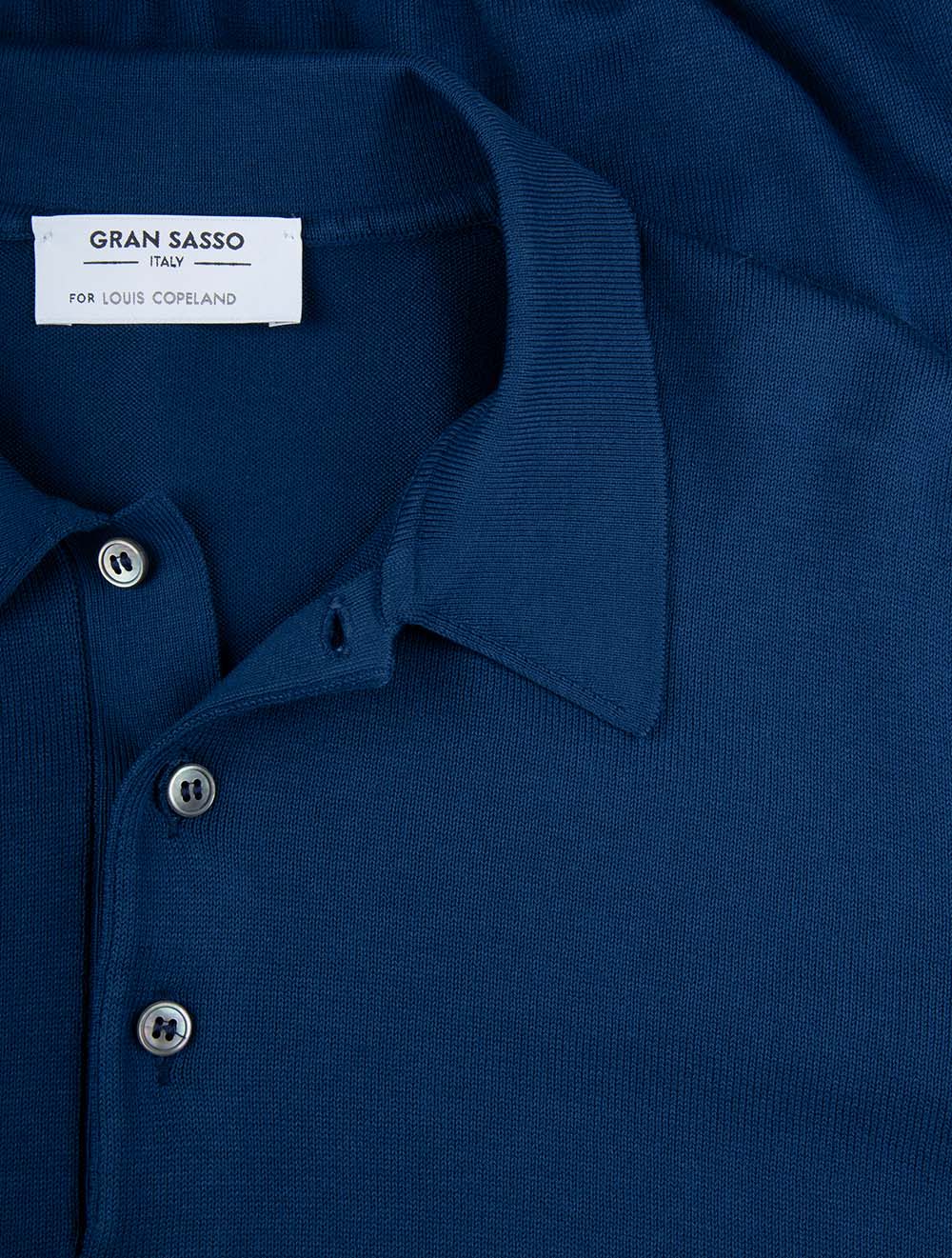 Polo de tennis en coton bleu marine